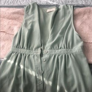 Green, deep V romper from Urban Outfitters.